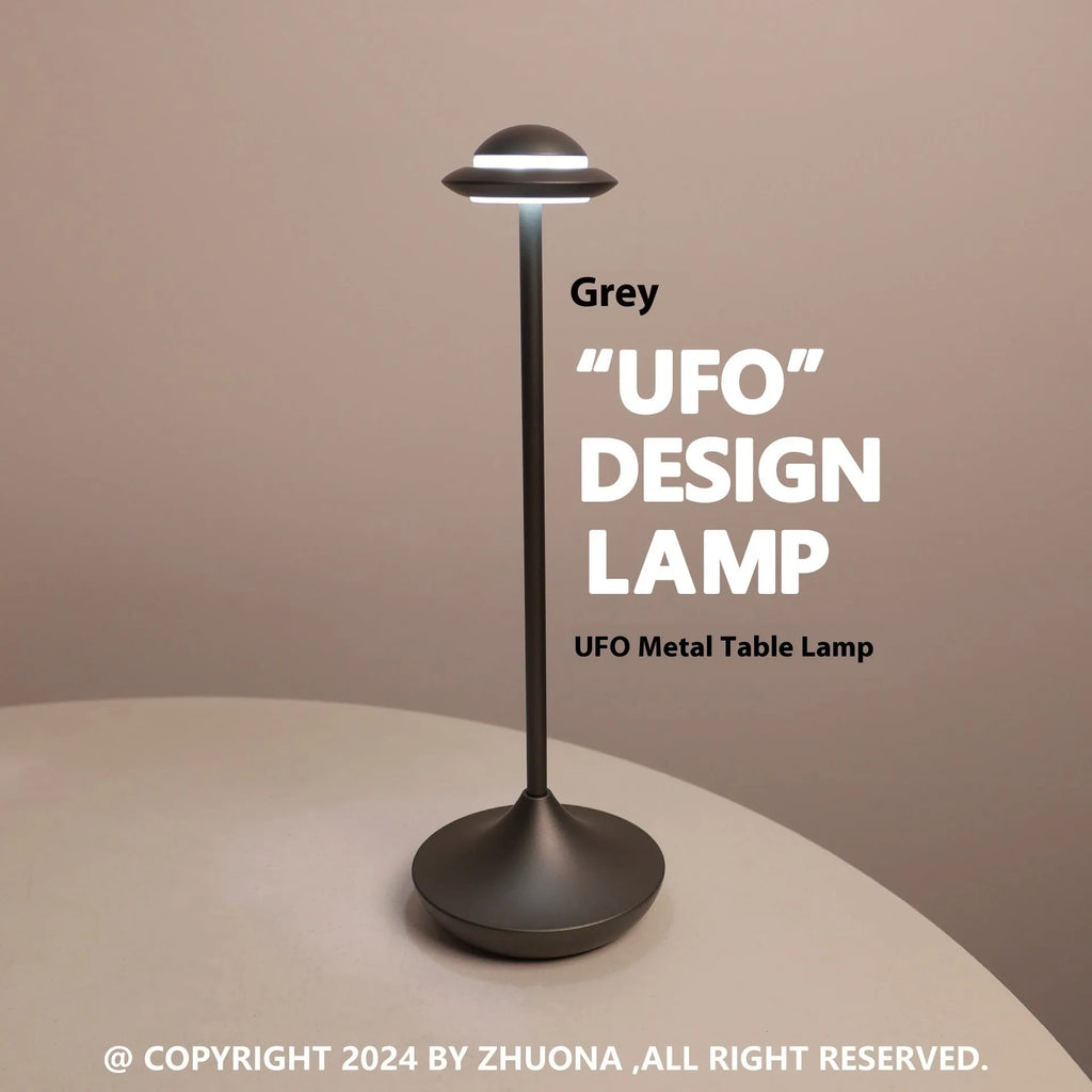Modern UFO-shaped metal table lamp with touch controls in black, gold, or grey colour options
