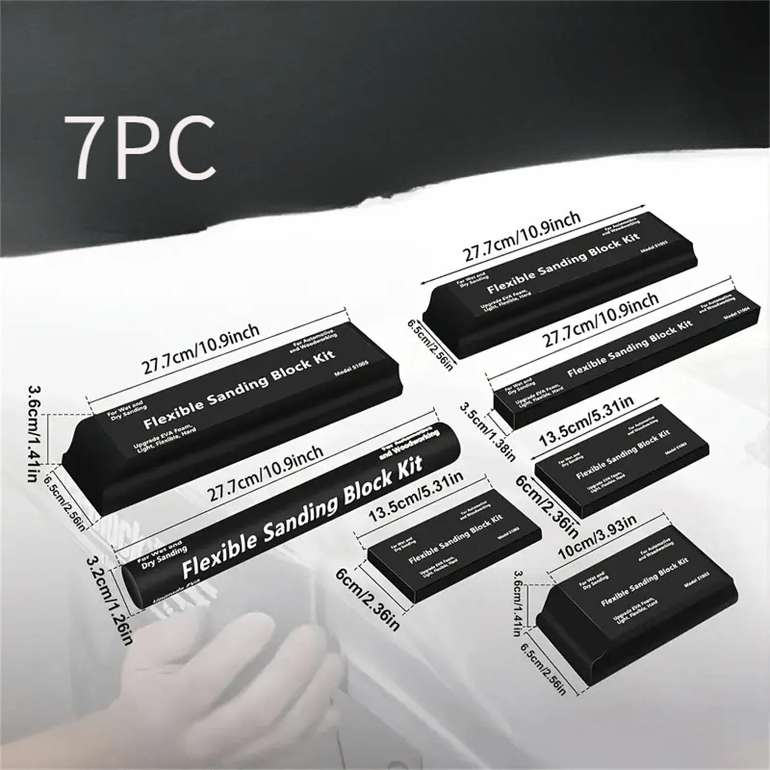 Seven black frosted building blocks with metal construction arranged as a set