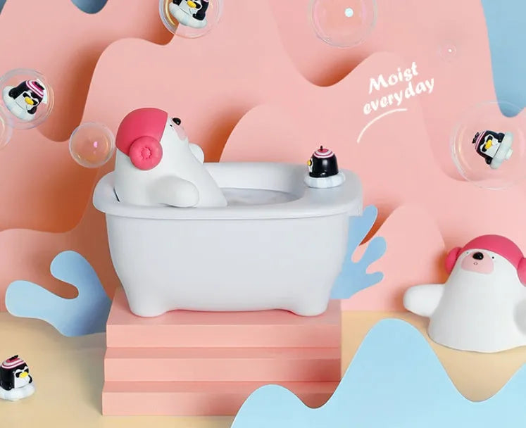 White polar bear-shaped USB desktop humidifier with water tank and mist output