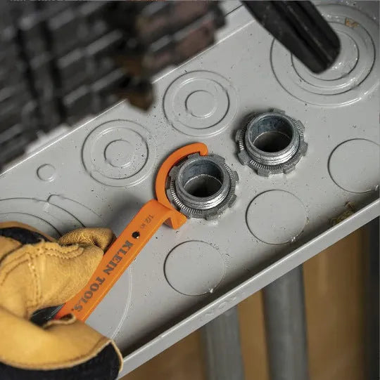 Three-piece wrench set showing orange, grey, and black wrenches with magnetic crescent and catheter locking types