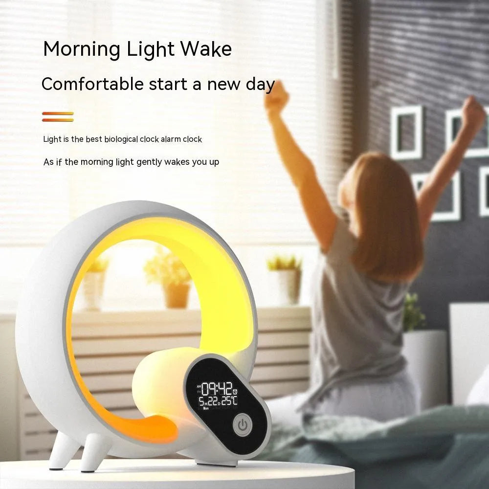 Creative Q Light analog sunrise digital alarm clock with 90 RGBCW light beads in black on wooden table