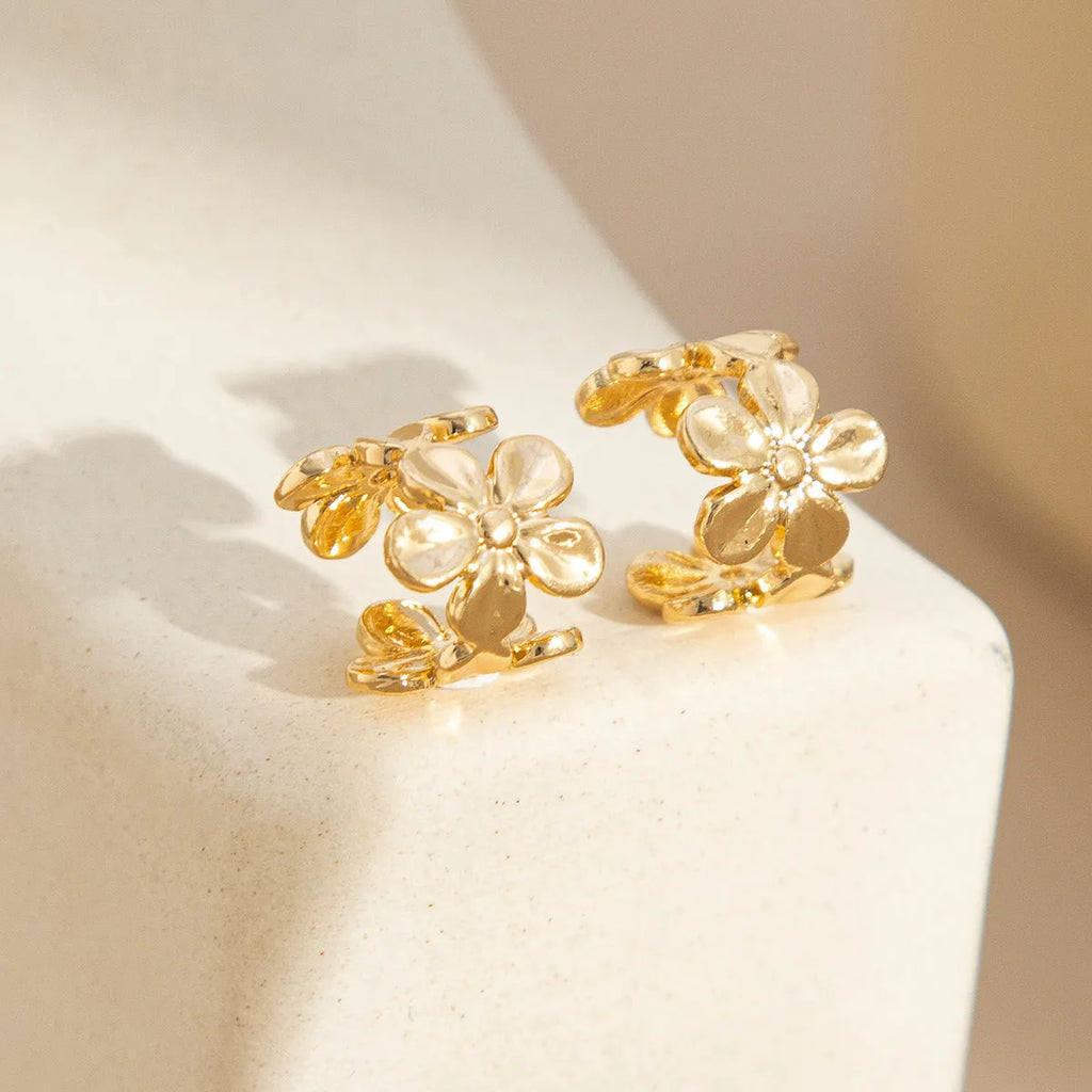 Women's gold starfish and conch shell drop earrings with marine-themed alloy charms