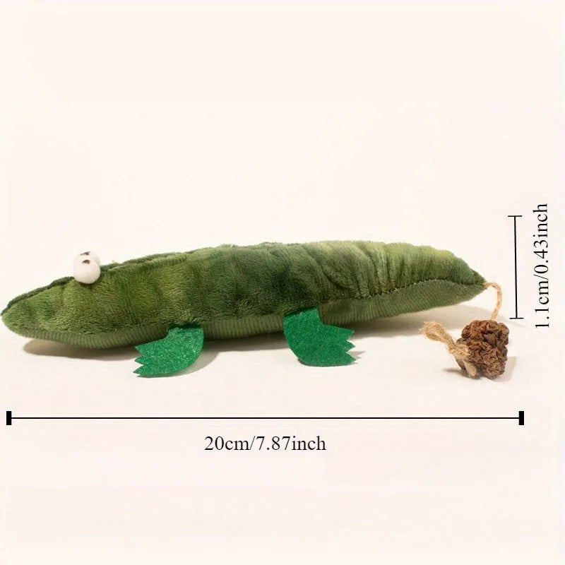 Green plush alligator cat toy with plant-based catnip and peppermint scent for oral cleansing and stress relief
