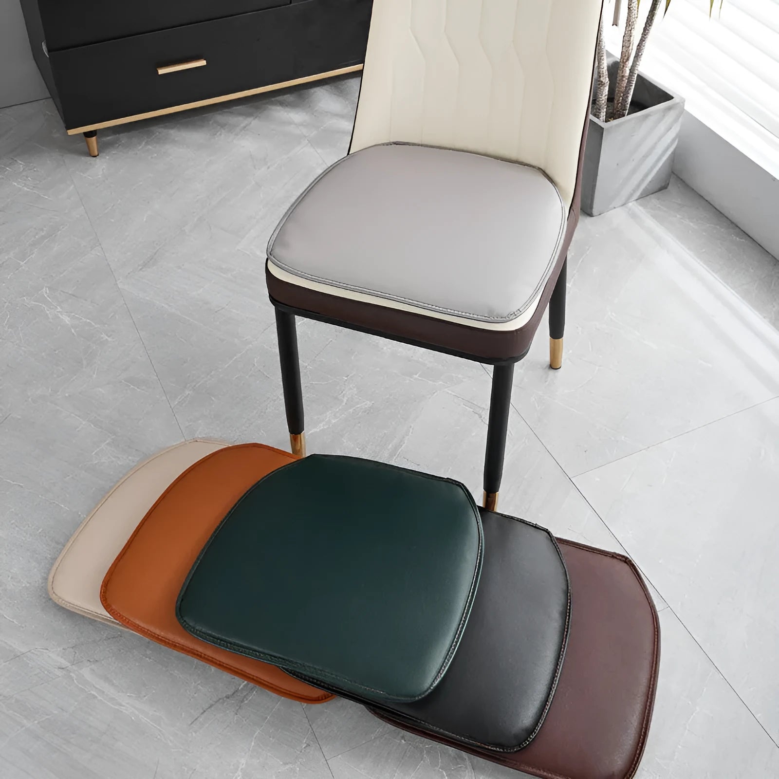 Leather horseshoe-shaped seat cushion with non-slip base in beige colour
