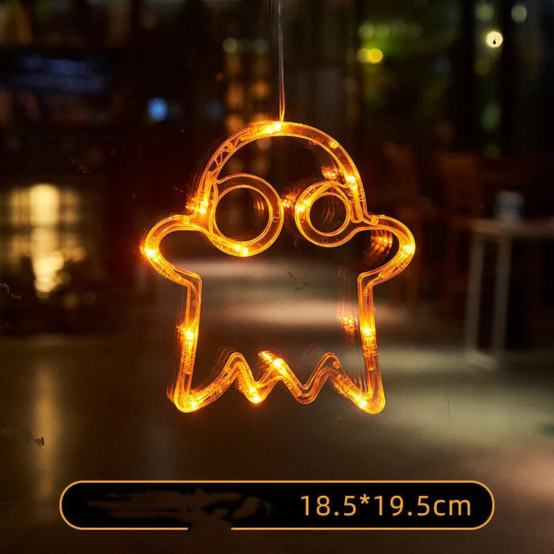 Seven Halloween themed battery-operated LED hanging lights with spider, pumpkin and ghost designs