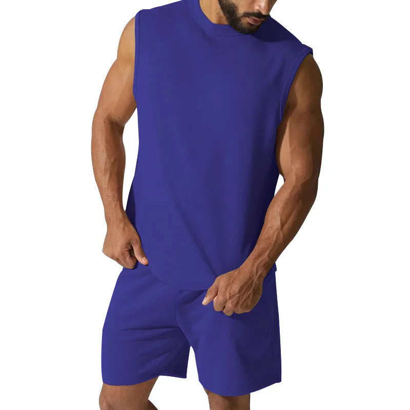 Men's sleeveless cotton blend sports top and matching shorts in a solid colour, laid flat.
