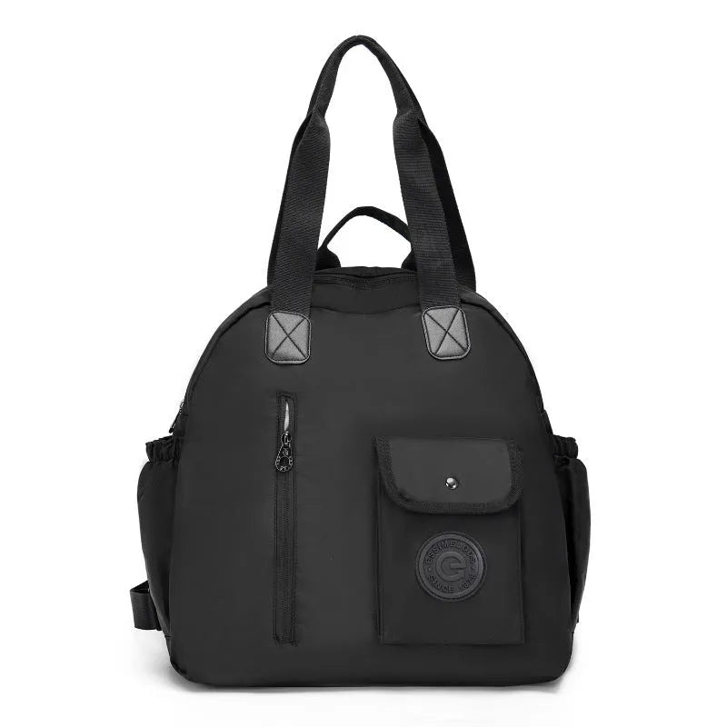 Large nylon backpack in black colour showing sandwich pocket design and dimensions