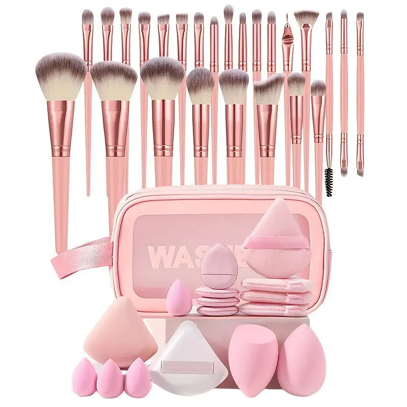 Beauty tool set with multiple pieces in brown, pink and purple colours for face wash and makeup application