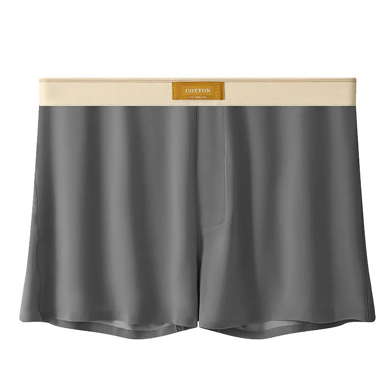 Pack of men's solid colour ice silk boxer shorts showing loose fit and mid-waist design.
