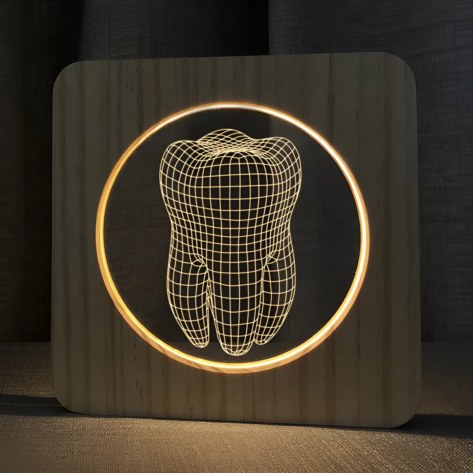 Tooth shaped wooden colour acrylic night lamp with USB cable on white background