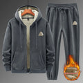 Men's grey hooded sports sweater and matching trousers laid flat.