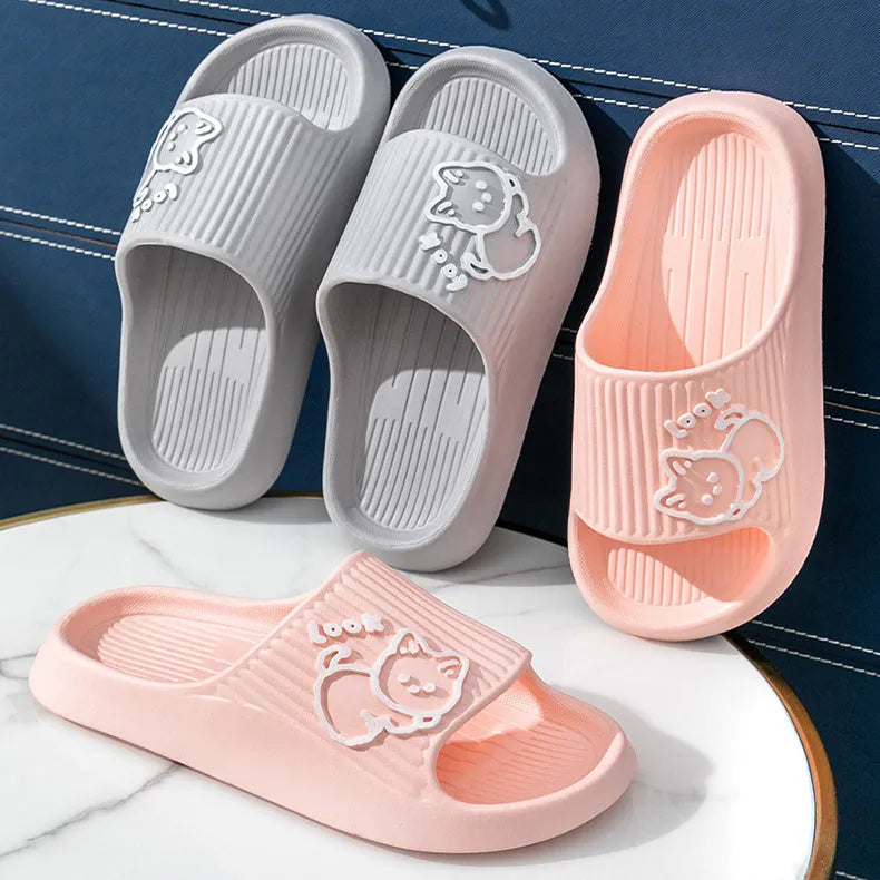 Green EVA foam cat slippers with thick platform sole and anti-slip pattern.