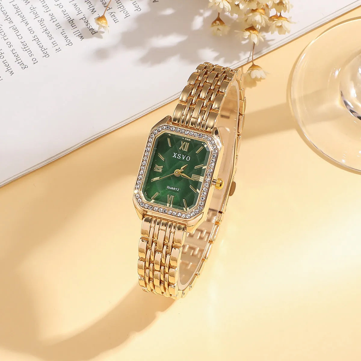 Women's gold green square watch with four matching bracelets in gift set packaging