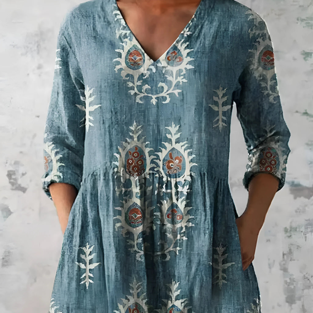 Women's printed wave dress with 3/4 sleeves and loose wide waist fitting in polyester fabric