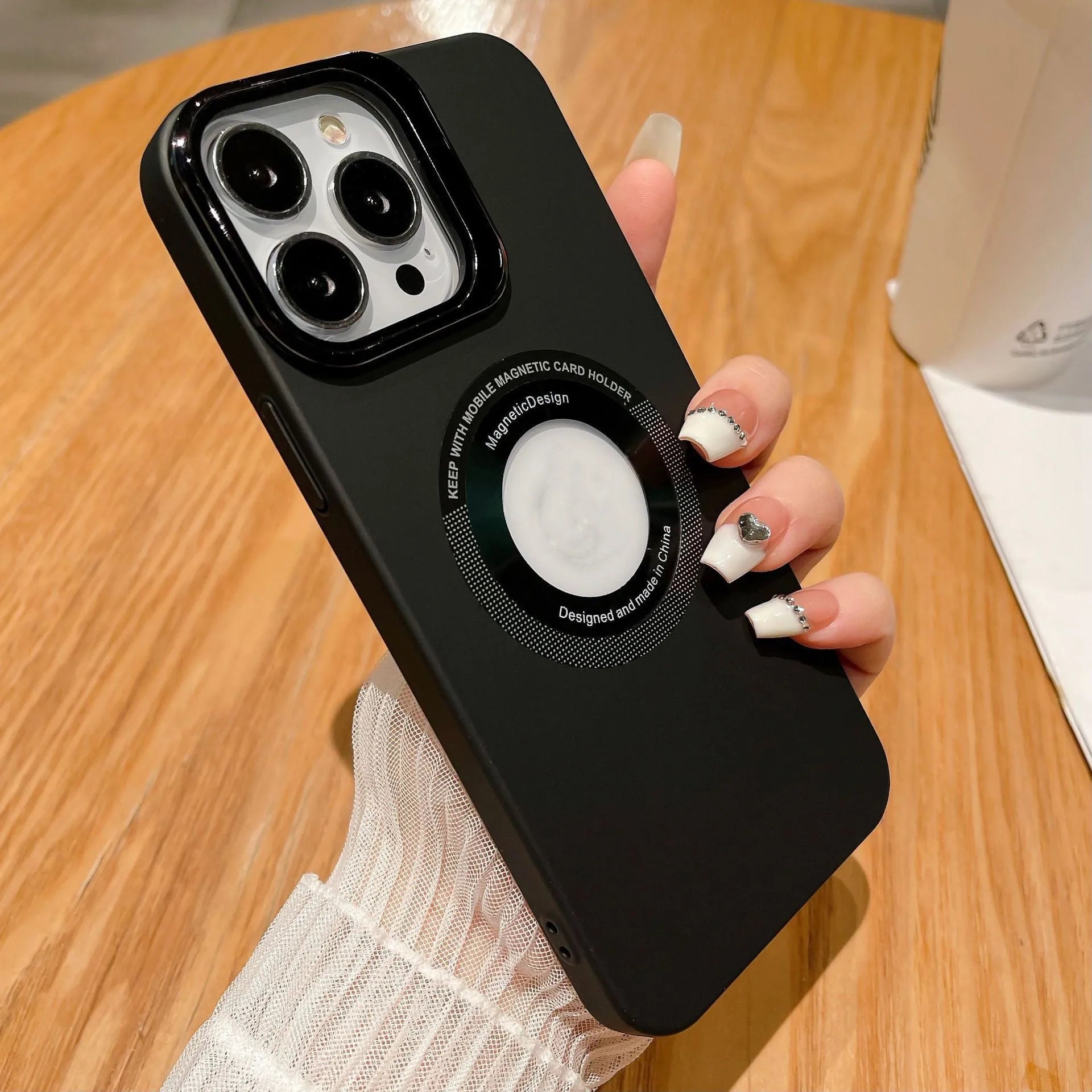 Fashion frosted magnetic suction phone case in black for iPhone 13 series showing solid colour and slim profile