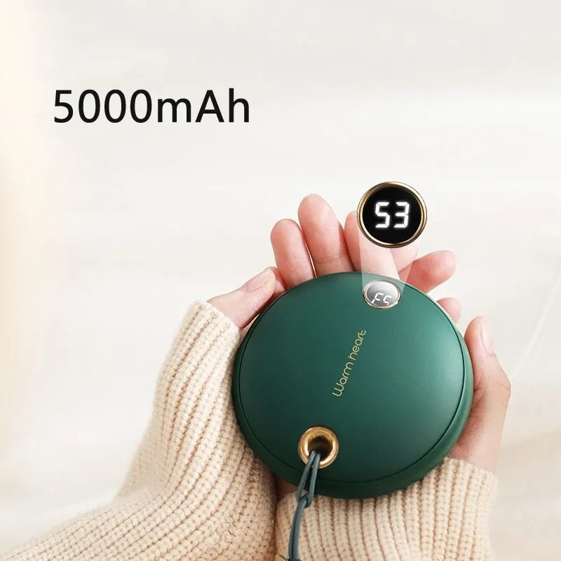 Green, pink or white portable power bank with digital display and integrated hand warmer function
