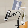 Black flexible mount holder holding tablet with adjustable arm and suction base