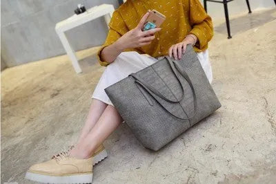 Simple black or grey fashion shoulder bag for women, spring summer 2021 collection