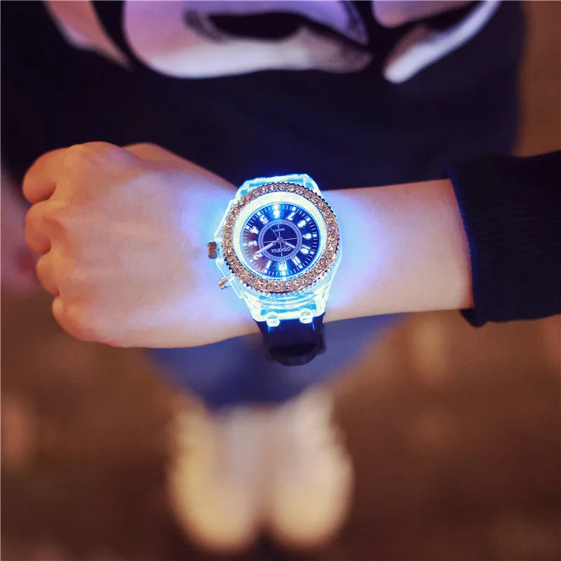 Women's LED luminous quartz watch with round 43mm alloy case and silicone strap in multiple colour options