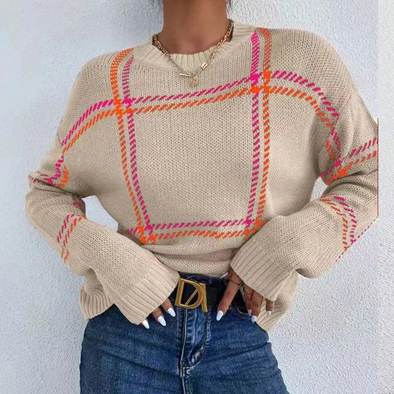 Women's loose-fit plaid sweater with apricot, black, beige, red, and green colour-block stripes.