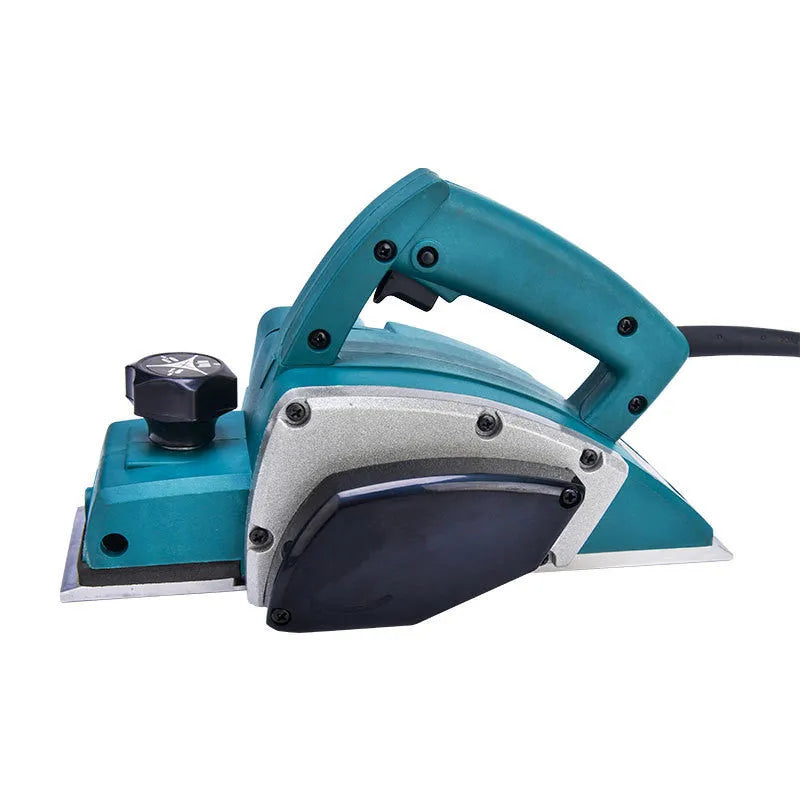 Red desktop electric wood planer with aluminium body showing 82mm planing width