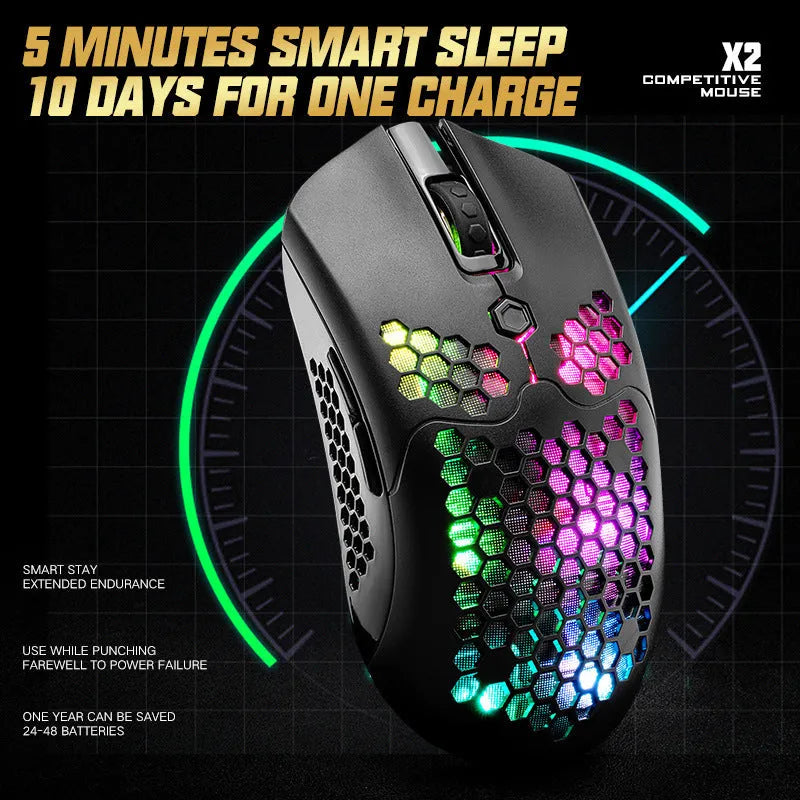 Free Wolf X2 wireless RGB gaming mouse with honeycomb shell in yellow colour on a desk.