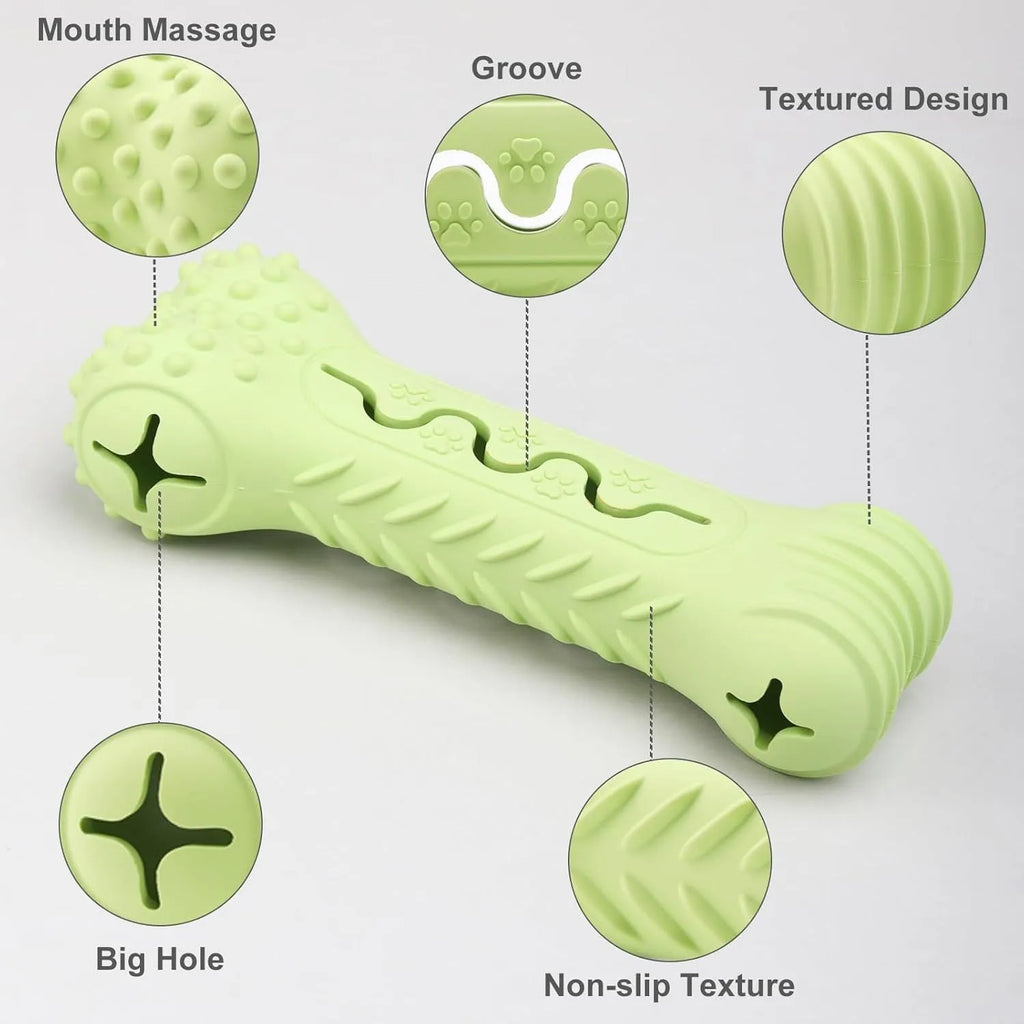 Blue natural rubber bone-shaped dog chew toy with textured surface and puzzle holes.
