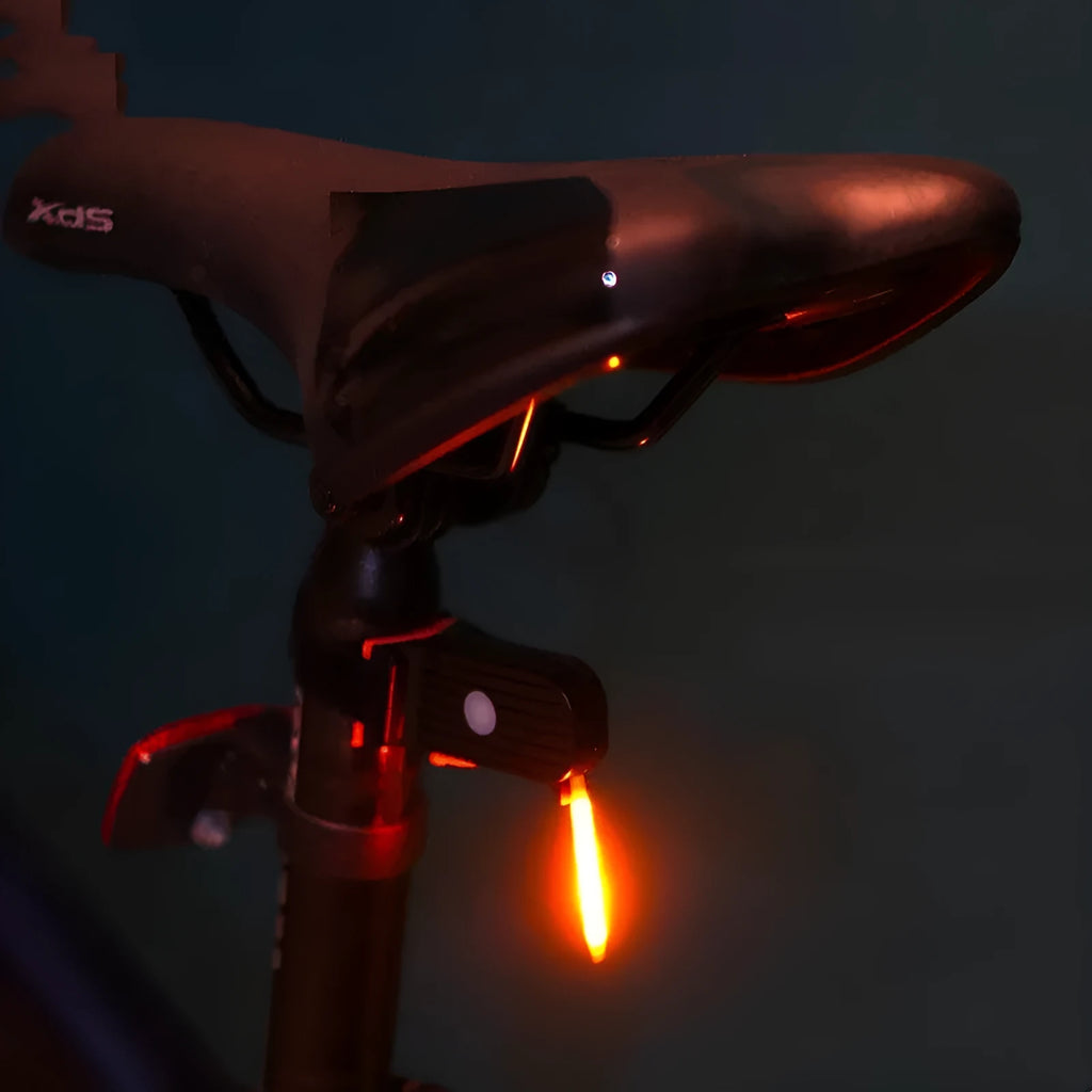 USB-charging waterproof bicycle rear taillight in blue, pink, red, white, or yellow colour options