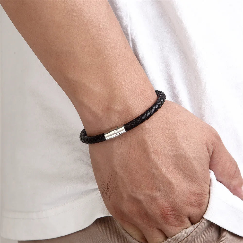 Men's geometric titanium steel bracelet with a magnetic clasp shown in silver tone.