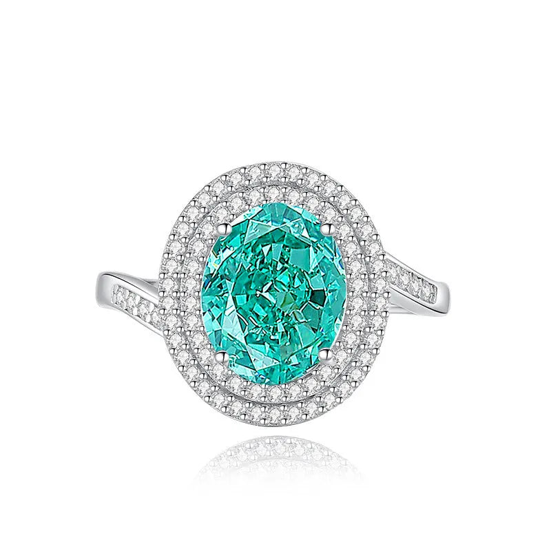 S925 sterling silver women's ring with ellipse emerald and inlaid high carbon diamond in geometric setting.