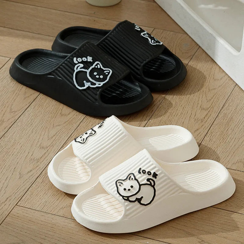 Green EVA foam cat slippers with thick platform sole and anti-slip pattern.