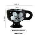 Hand-pinched irregular shaped ceramic mug in a solid colour, modern simple design