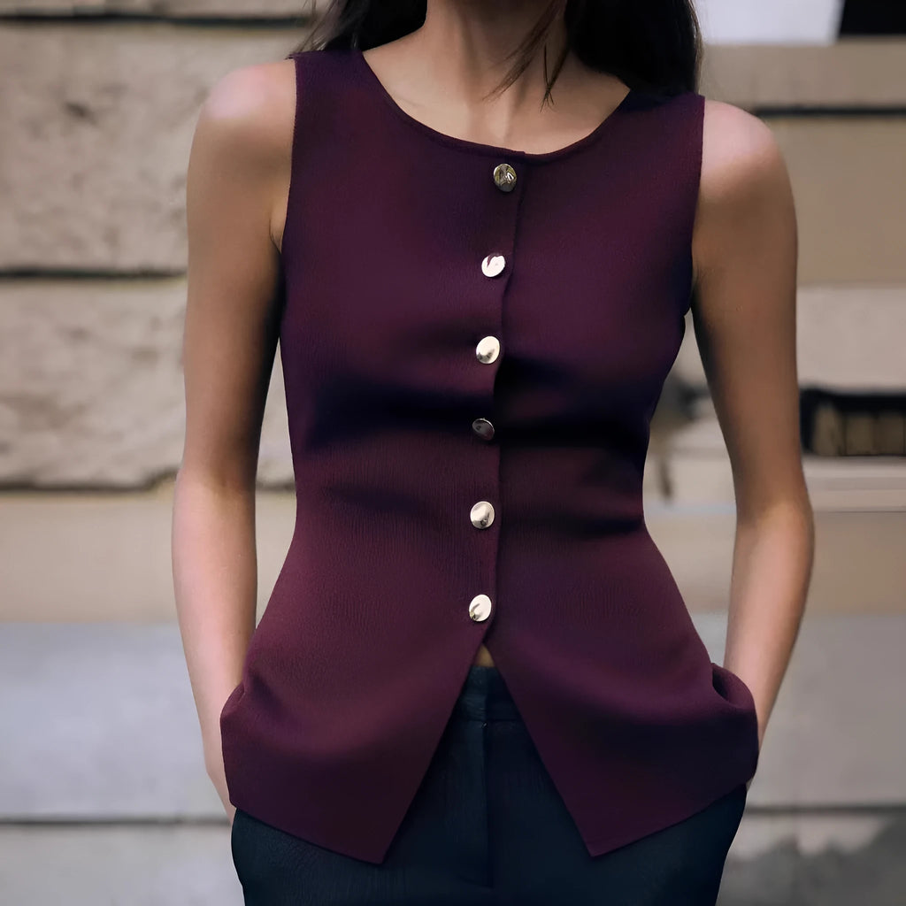 Dark red women's slim-fit viscose sweater vest with a 3D pattern, shown on a hanger.