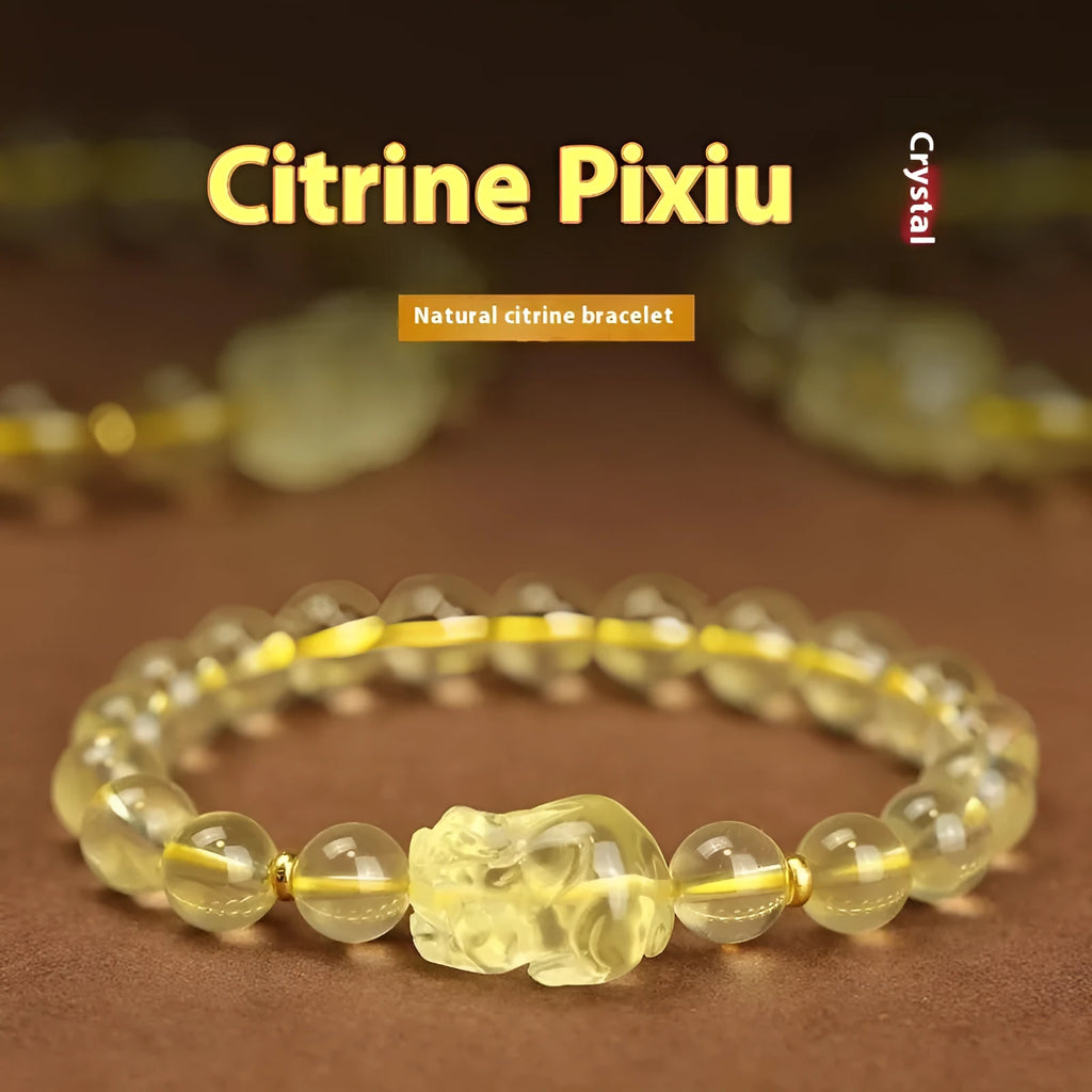 Yellow leather bracelet with a clear artificial crystal Pi Xiu charm.