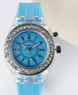 Women's LED luminous quartz watch with round 43mm alloy case and silicone strap in multiple colour options