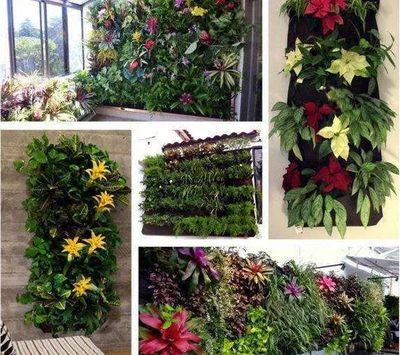 Vertical felt wall garden planter with multiple planting pockets hanging on outdoor wall