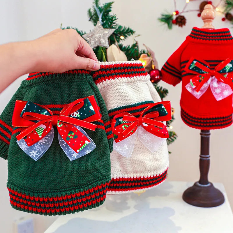 Red Christmas jumper for a small dog on a festive background