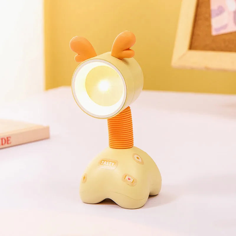 DIY magnetic cartoon small night lamp with multi-angle adjustable lighting on desktop