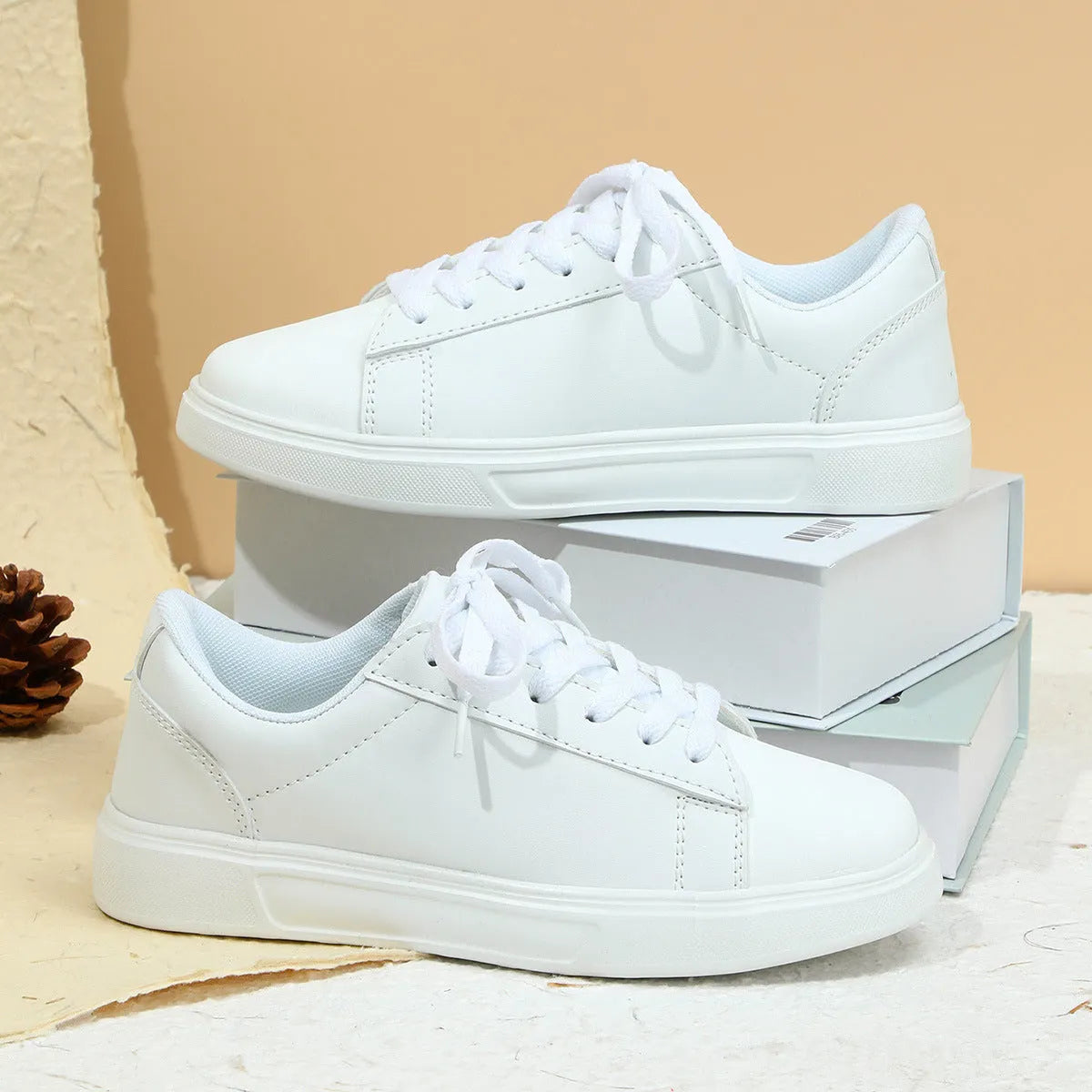 Casual beige brown platform skateboard sneaker with cross strap detail and round toe