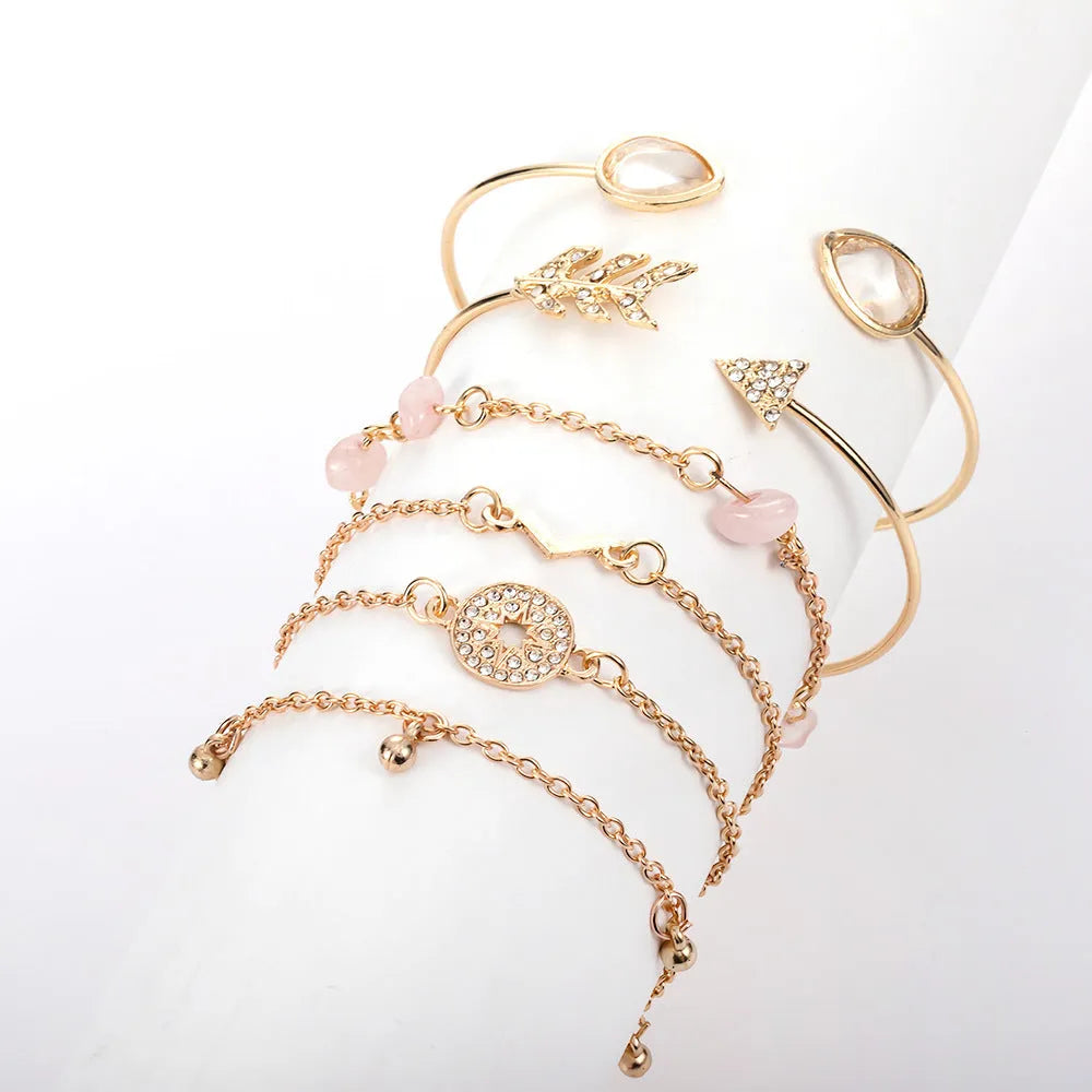 Gold-coloured six-piece zinc alloy bracelet set with water drop, V-shaped, arrow, drill and spot designs