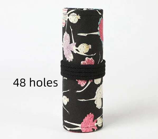 Square canvas rolling pencil case with ballet girl print, unfurled to show multiple pencil slots.