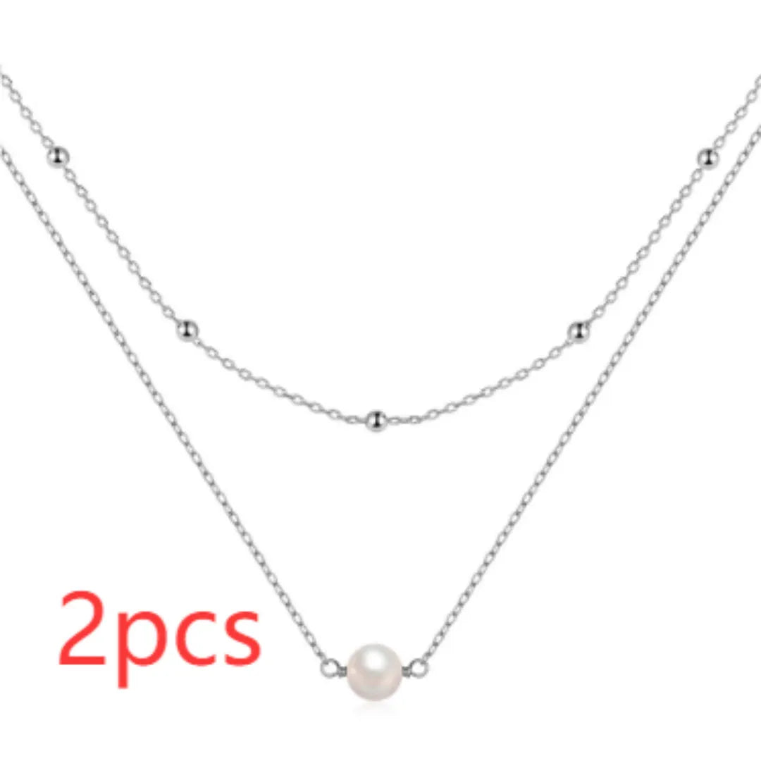 S925 sterling silver double layer women's necklace with twin pearls and geometric pendant on ball bead chain.
