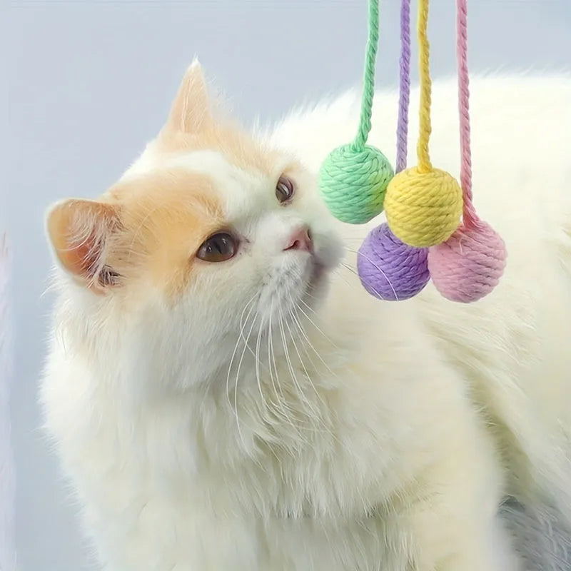 Cat toy ball with rope and built-in bell in multiple colours for kitten play