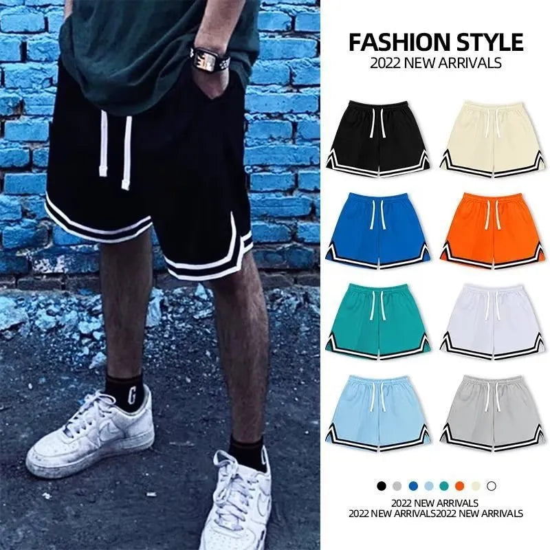 Men's polyester sports shorts in loose fit design available in multiple colours including black, white and blue shades