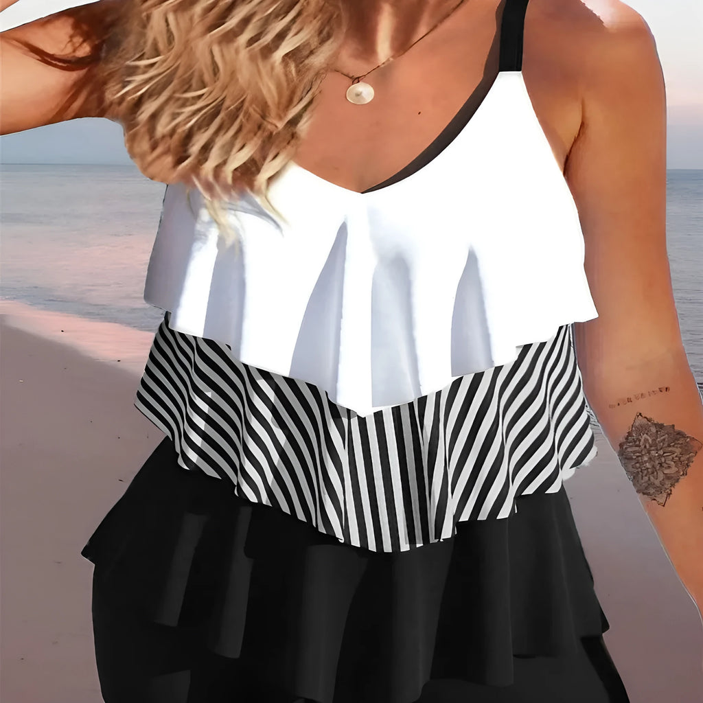 Women's sleeveless backless spaghetti-strap bikini with ruffle detail in various colours and patterns