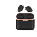 Black wireless Bluetooth headphones with charging case on a table.
