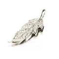 Silver metal USB flash drive with a crystal maple leaf decoration on a white background.