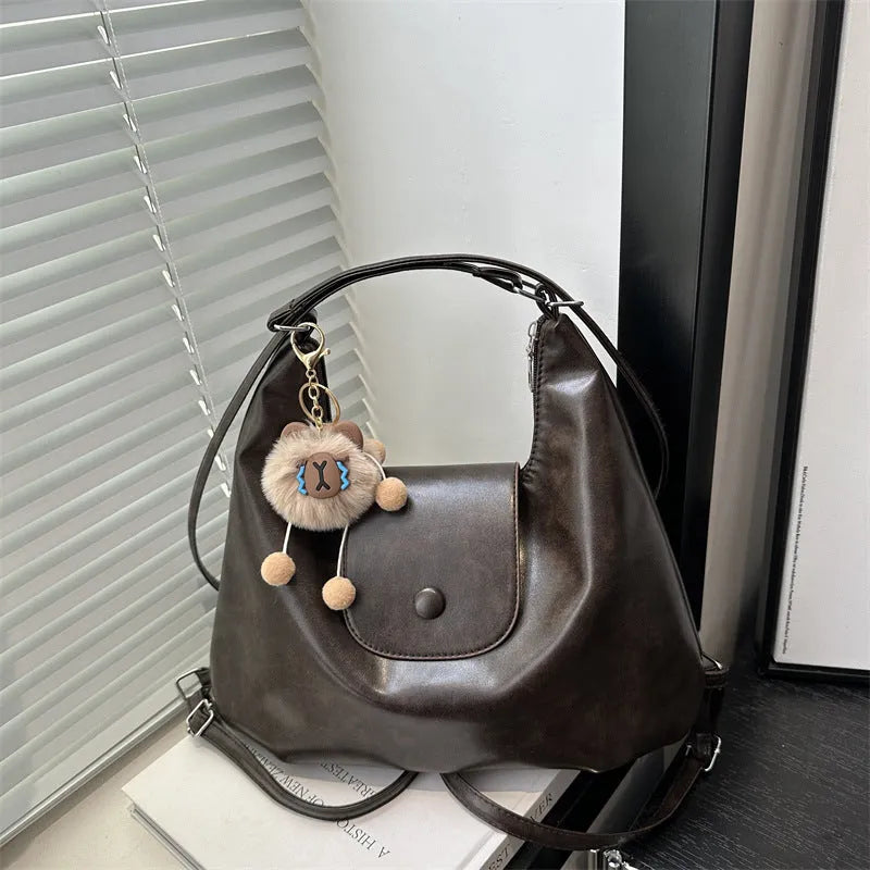 Textured PU leather women's shoulder backpack in horizontal square shape with single strap