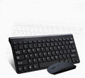 Wireless black keyboard and mouse set with 4G connectivity on wooden desk