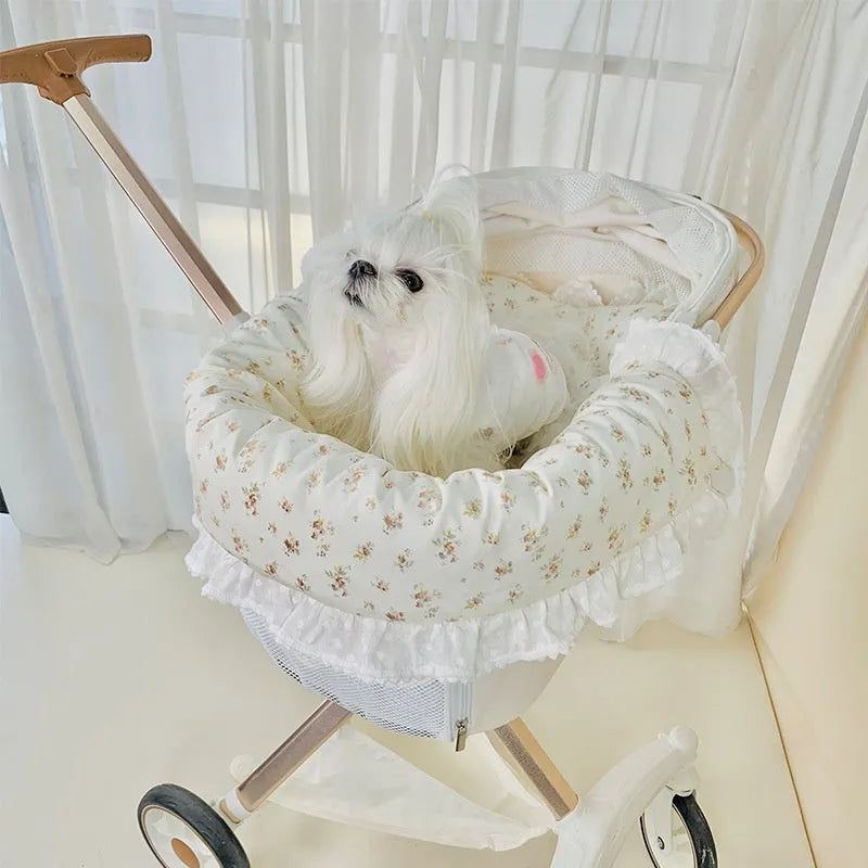 Pet stroller three-piece accessory set showing anti-dirty towel, cushion, and pillow in cotton cloth with floral pattern